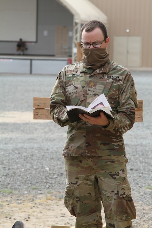 Army chaplain conducts a service.