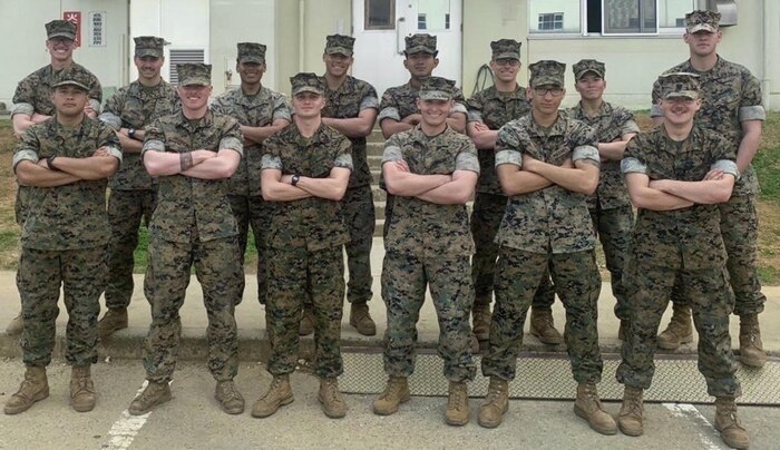 The winning squad consisted of: Sgt. Francisco Corona, Cpl. Jason Holdorf, Cpl. Garret Groshong, Cpl. Harris Alliger, Lance Cpl. Chloe Pham, Lance Cpl. Santino Imparato, Lance Cpl. John Andrzejek, Lance Cpl. Alexander Griffin, Lance Cpl. Kevin Argueta, Lance Cpl. Tyler Helms, Lance Cpl. Austin Atwood, Lance Cpl. Bryan Zuniga, Lance Cpl. William Agnew and Petty Officer 3rd Class Joseph Iffrig. Photo taken prior to COVID-19 social distancing guidelines. (U.S. Marine Corps Courtesy Photo / Released)