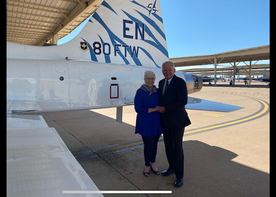 Glenn Barham, President of the Sheppard Military Affairs Committee, and his wife Mary Lynne pose for a photo at Sheppard Air Force Base, Texas, June 5, 2020. They were the most recent inductees to the Euro-NATO Joint Jet Program's Hall of Fame. Their support towards the 80th Flying Training Wing includes, organizing support for air shows, steering committee dinners, securing state funding and much more. (U.S. Air Force photo by 2nd Lt. Megan Morrissey)