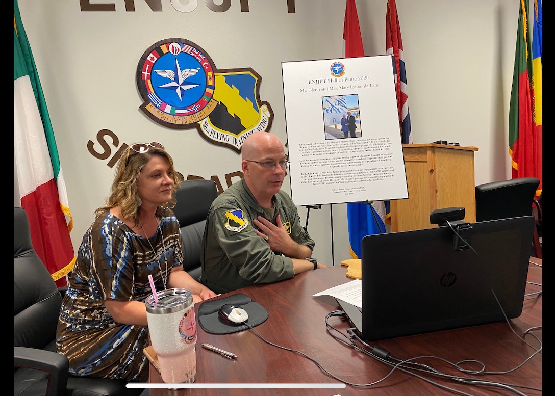 Col. Russell Driggers, 80th Flying Training Wing commander, and his wife, Janet, hold a virtual Hall of Fame induction ceremony for Glenn Barham, President of the Sheppard Military Affairs Committee, at Sheppard Air Force Base, Texas, June 15, 2020. Barham was appointed to the Euro-NATO Joint Jet Pilot Training Program's Hall of Fame for all of his support towards the 80th Flying Training Wing. (U.S. Air Force photo by 2nd Lt. Megan Morrissey)