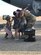 Lt. Col. Paul Smith’s children welcome him home with American flags and group hugs June 14, 2020, at Beale Air Force Base, California.