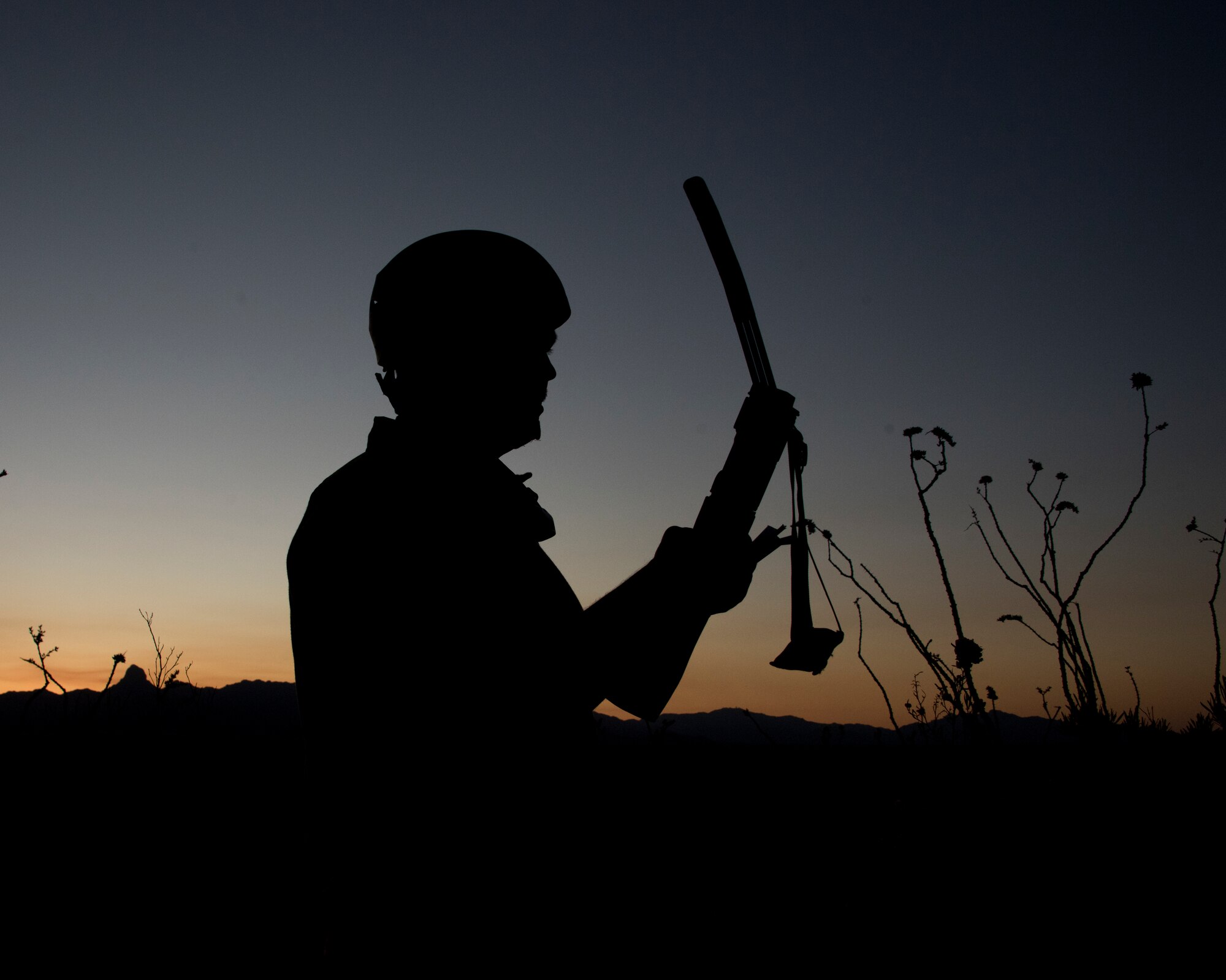 A photo of an Airman using a communication tool