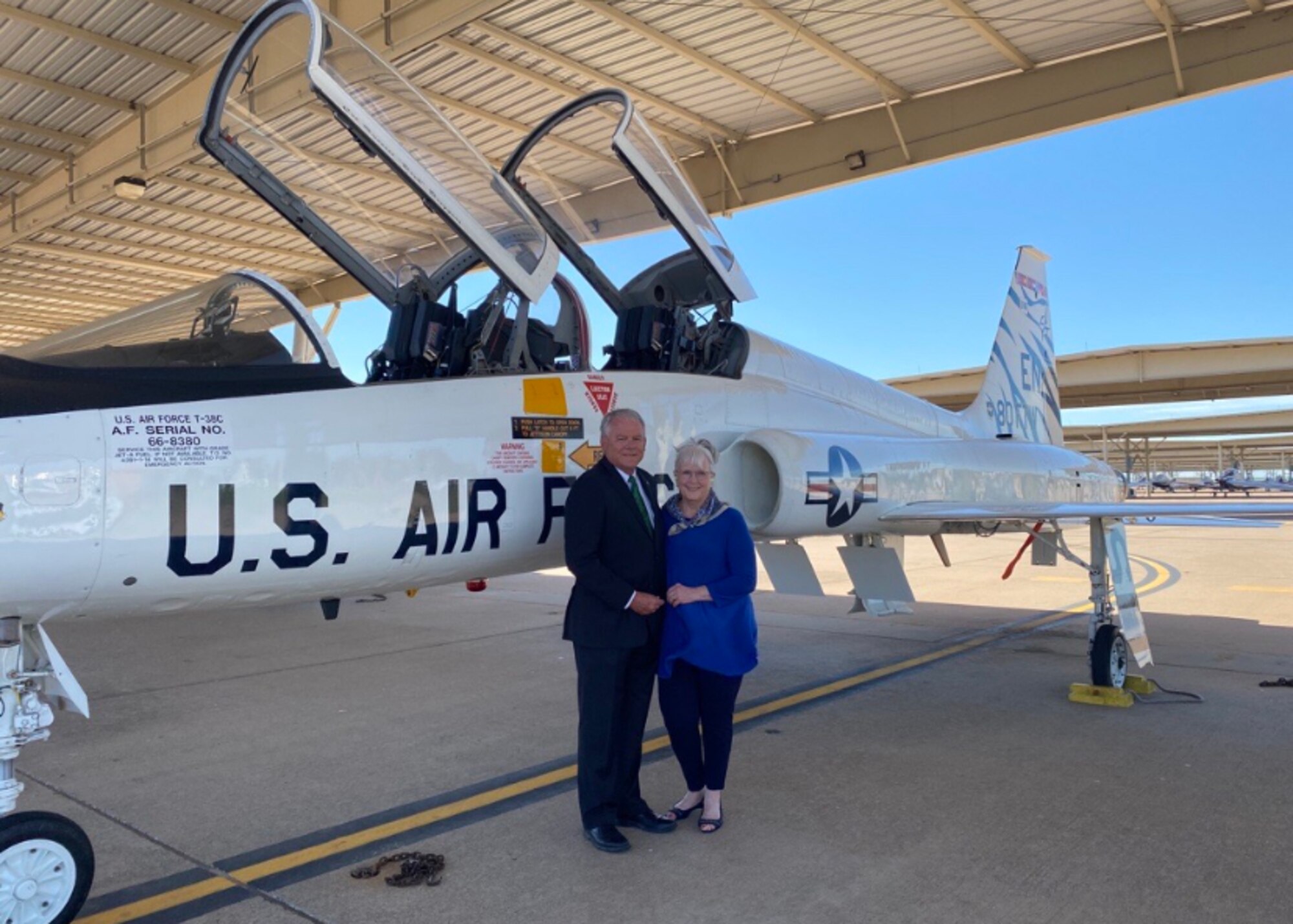 Glenn Barham, President of the Sheppard Military Affairs Committee, and his wife Mary Lynne pose for a photo at Sheppard Air Force Base, Texas, June 5, 2020. They are the most recent inductees to the Euro-NATO Joint Jet Pilot Training Program Hall of Fame for their continued support to the 80th Flying Training Wing. (U.S. Air Force photo by 2nd Lt. Megan Morrissey)