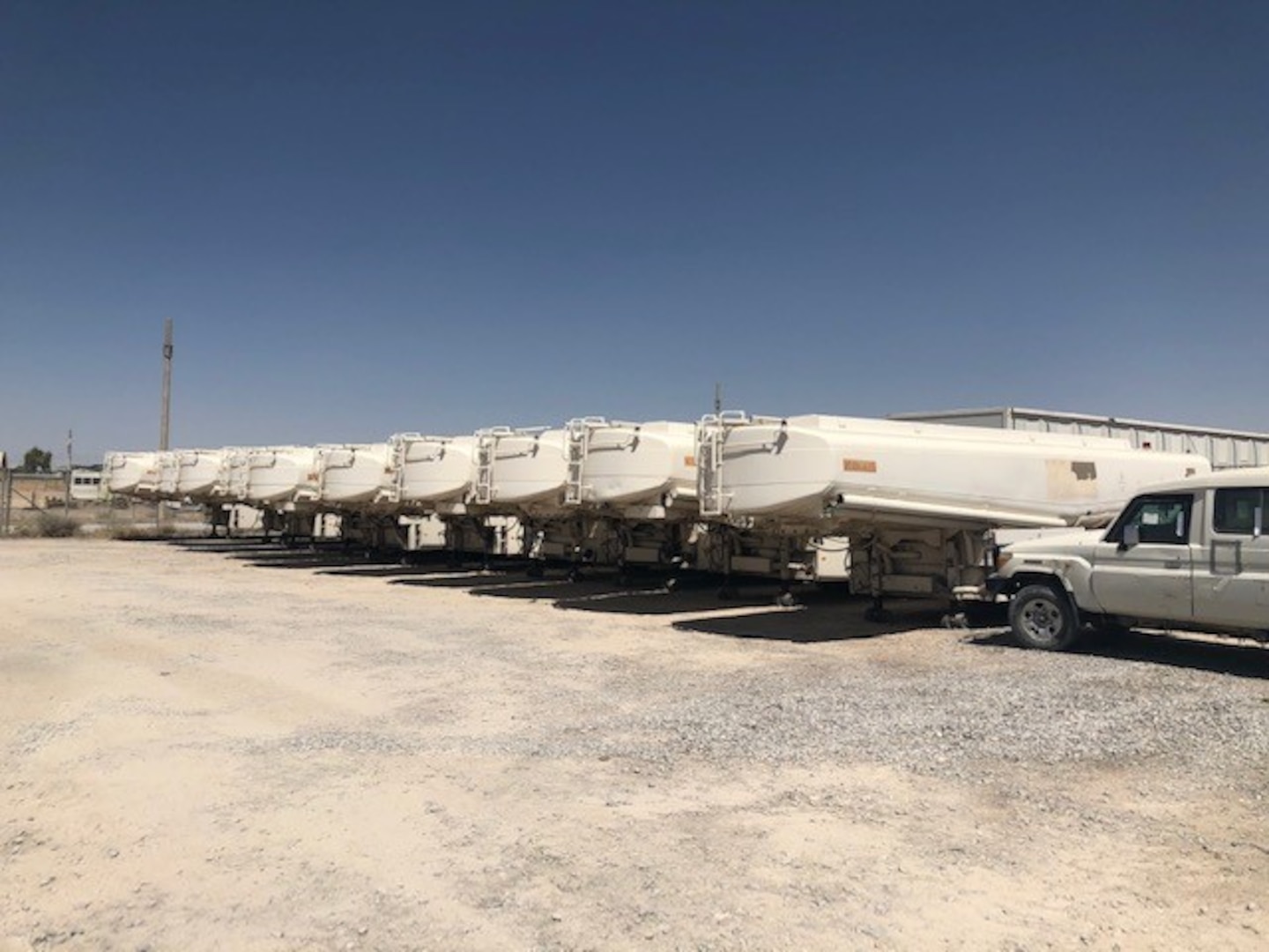 Tanks for ten NATO bulk fuel carriers awaiting destruction at DLA Disposition Services' Kandahar site.