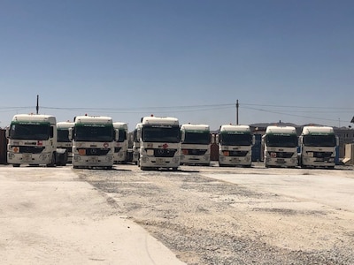 Ten NATO bulk fuel carriers received at DLA Disposition Services' Kandahar site await their end.