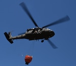 New York Army National Guard UH-60 Black Hawk helicopter crews conduct water bucket training in Riverhead, New York, June 12, 2020. The New York Army National Guard conducts helicopter firefighting when local agencies request support through the New York State Department of Homeland Security and Emergency Services.