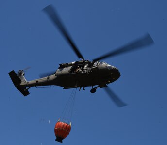 New York Army National Guard UH-60 Black Hawk helicopter crews conduct water bucket training in Riverhead, New York, June 12, 2020. The New York Army National Guard conducts helicopter firefighting when local agencies request support through the New York State Department of Homeland Security and Emergency Services.