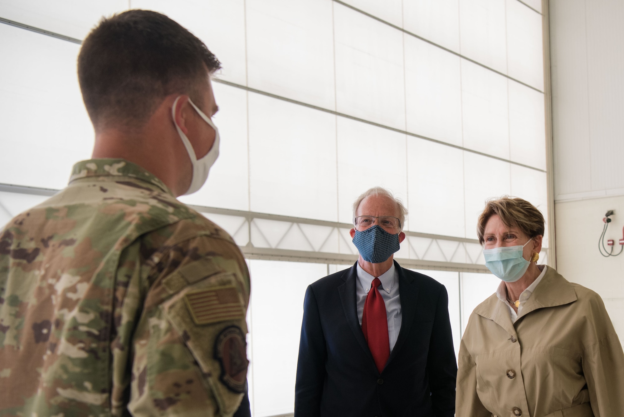 Secretary of the Air Force Barbara Barrett and U.S. Sen. Jerry Moran praise Tech. Sgt. Nathan A. Zachary, 22nd Logistics Readiness Squadron non-commissioned officer in charge of cargo movement, on his accomplishment of 22nd Mission Support Group Superior Performer June 10, 2020, at McConnell Air Force Base, Kansas. Zachary was recognized as a superior performer for managing logistics for a presidential support mission and leading cargo movements that processed 2,600 assets. (U.S. Air Force photo by Senior Airman Alexi Bosarge)