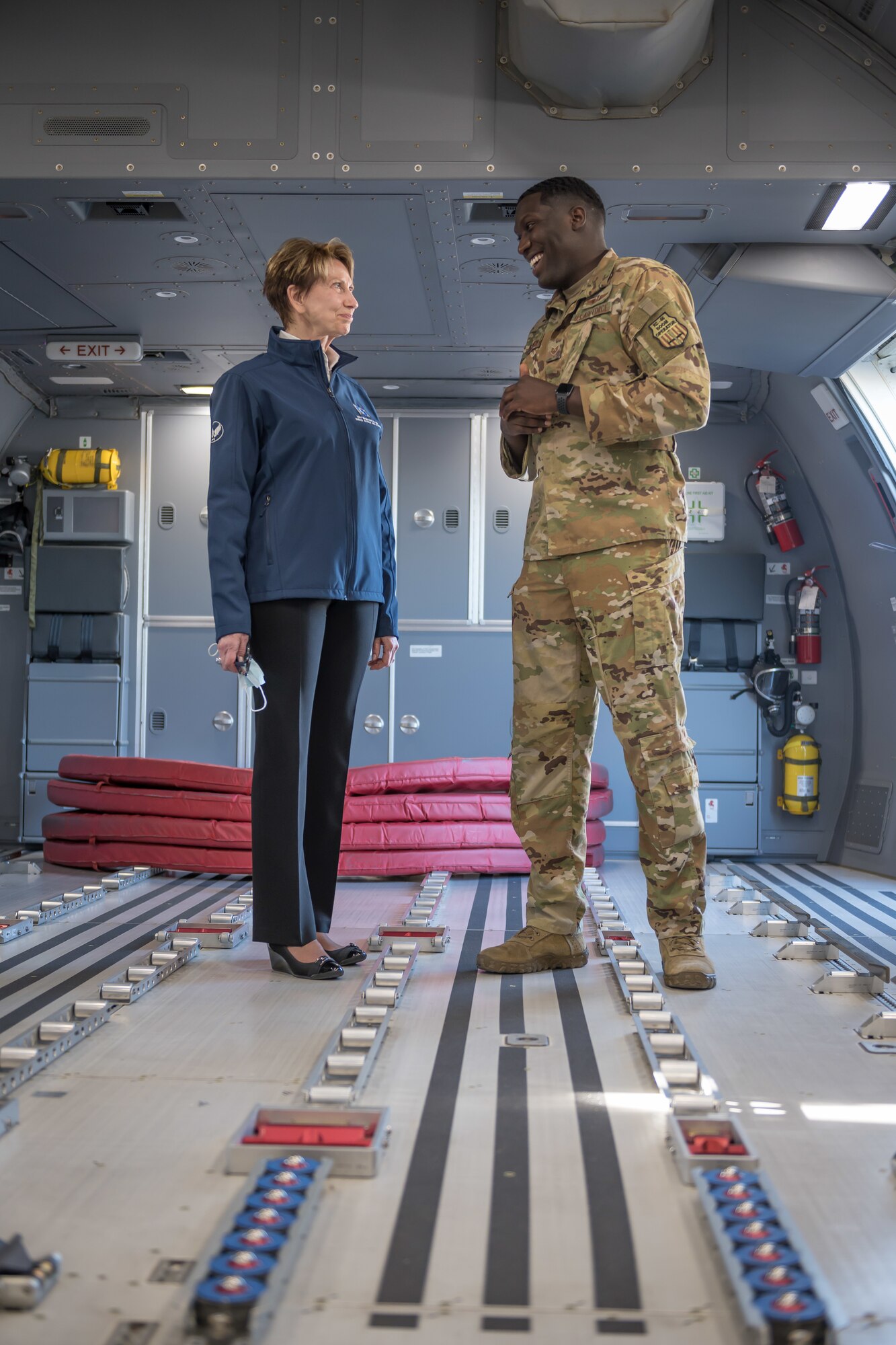 Secretary of the Air Force Barbara Barrett, left, talks to Staff Sgt. Devaughn Granger, 344th Air Refueling Squadron in-flight refueling specialist evaluator, before a flight on a KC-46A Pegasus June 10, 2020, at McConnell Air Force Base, Kansas. Granger showed Barrett the aircraft’s aerial refueling functionality during a local sortie with another KC-46. (U.S. Air Force photo by Staff Sgt. Chris Thornbury)