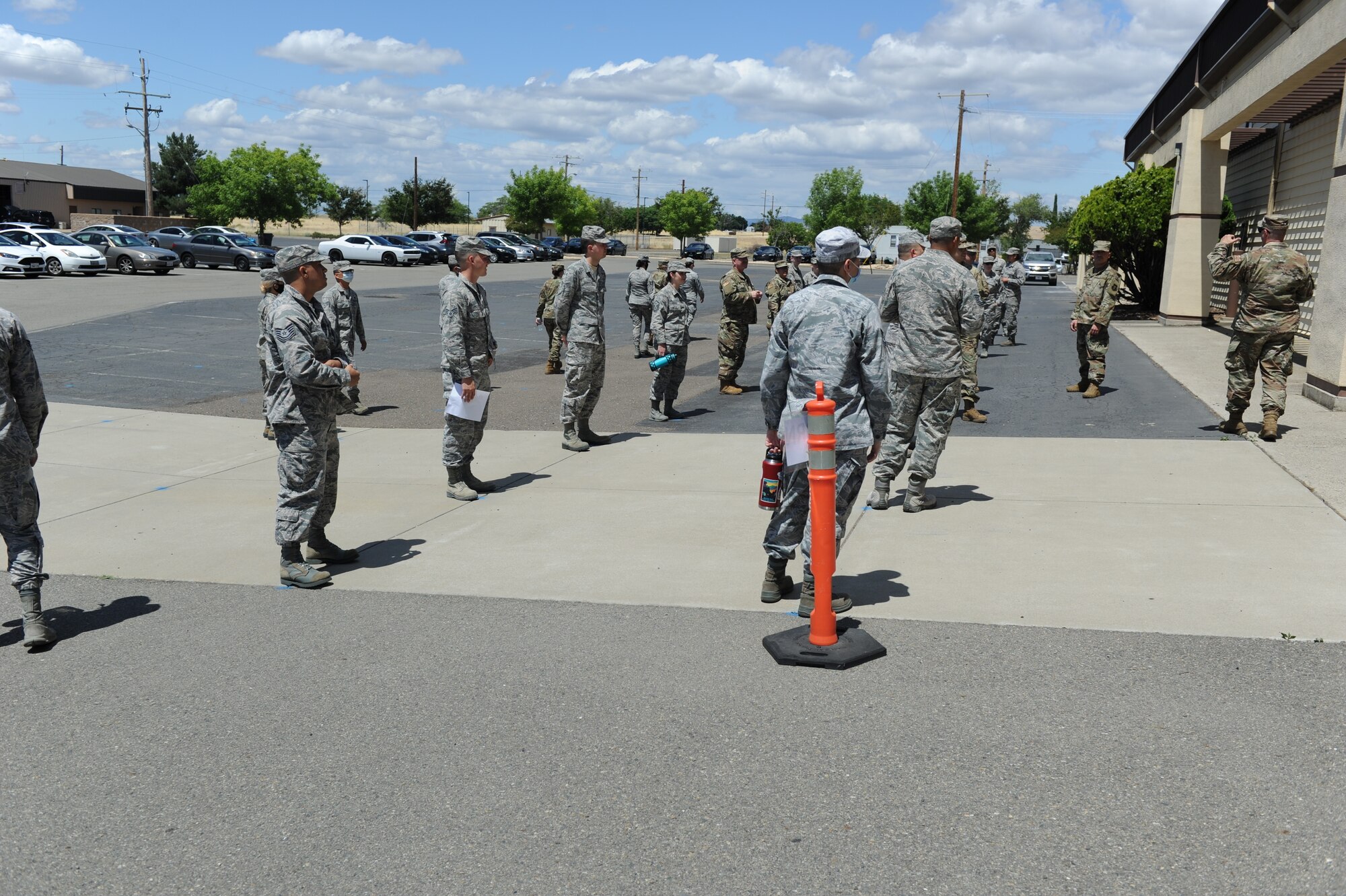 Airmen assigned to the 940th Air Refueling wing wait to enter the Civil Engineer warehouse June 13 at Beale Air Force Base, California.