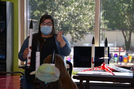 Valerie Acosta, STARBASE Kelly, summer camp instructor, explains how the rockets built by the class would function during the launch procedure June 12, 2020 at the Lackland Youth Center, Joint Base San Antonio-Lackland, Texas.