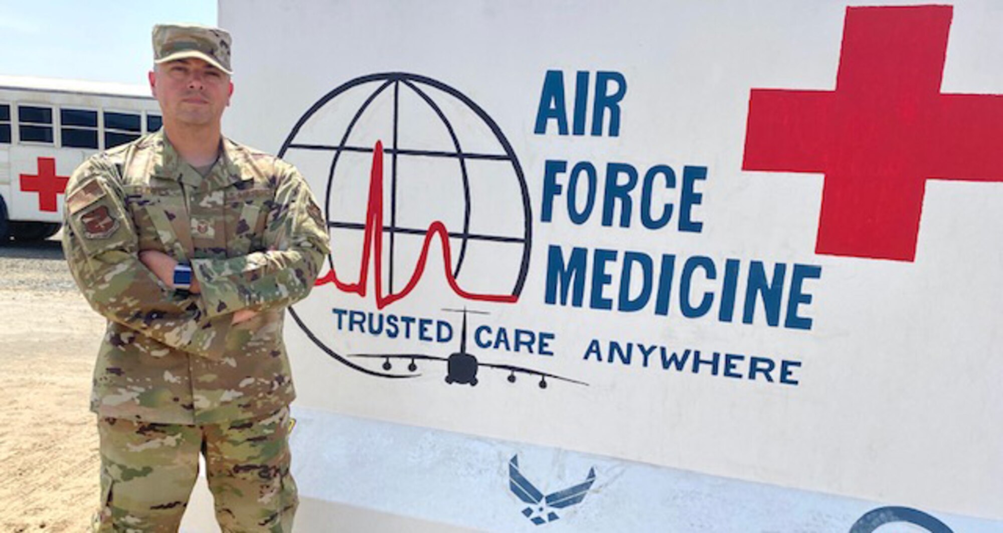 Master Sgt. David Flores, 380th Expeditionary Medical Group first sergeant, is responsible for the health, morale, conduct, and welfare of all Airmen in his unit. Flores, pictured in front of his unit’s mural, June 16, 2020, is one of five Reservists who deployed here, all working in the same capacity in various units from the 301st Fighter Wing at Naval Air Station Joint Reserve Base, Fort Worth, Texas. (U.S. Air Force photo by Tech. Sgt. Melissa Harvey)
