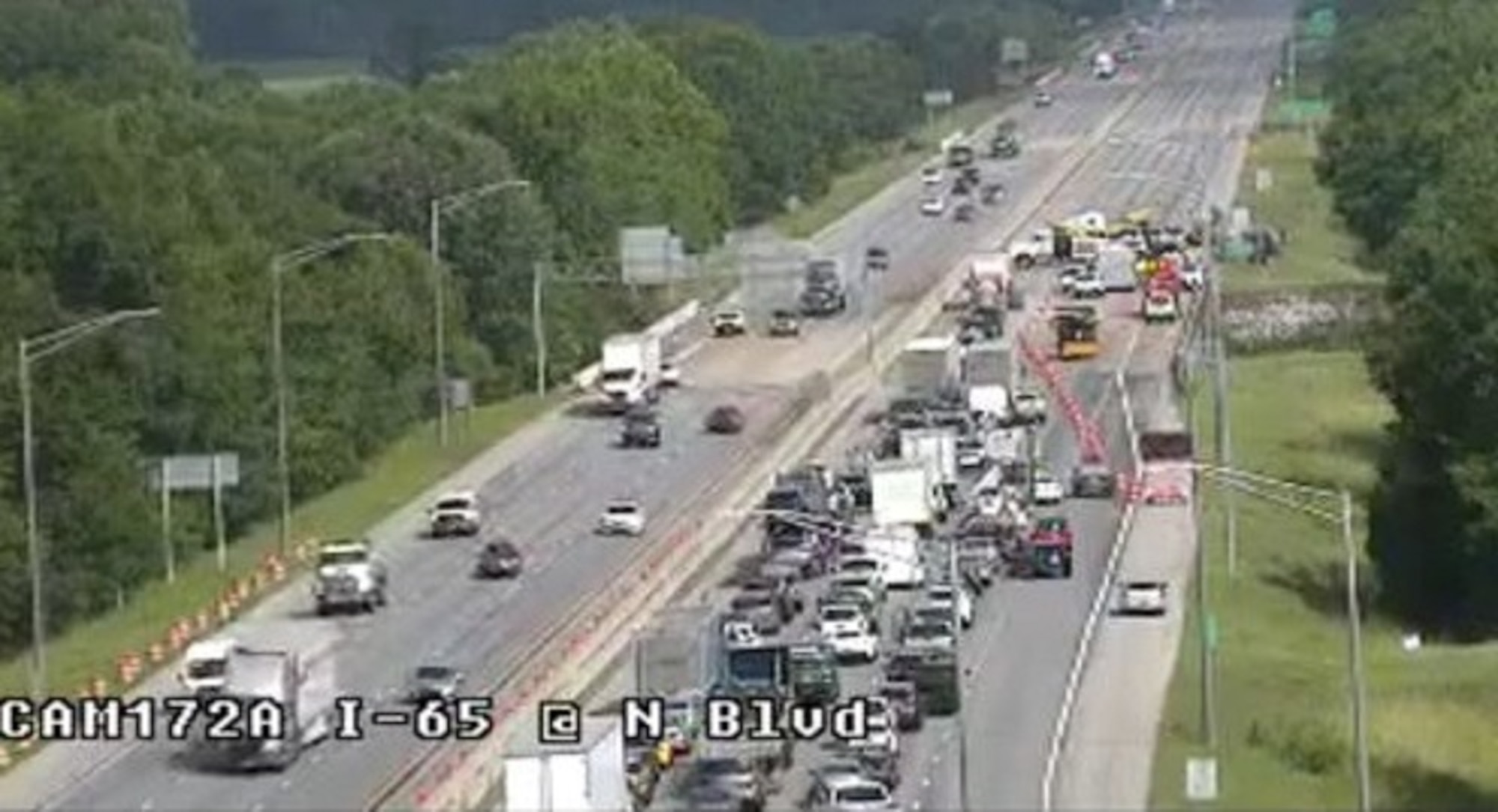 An overturned chemical tanker truck blocked the right two lanes of I-65 Northbound near Montgomery, Ala., June 9, 2020. One of the first motorists on the scene was first-year Office of Special Investigations Special Agent Jonathan Parker, OSI Detachment 405, Maxwell Air Force Base, who coupled his Air Force and OSI training as a Good Samaritan, to render life-saving aid to the injured truck driver and assist the first responders on the scene. (ALDOT photo)