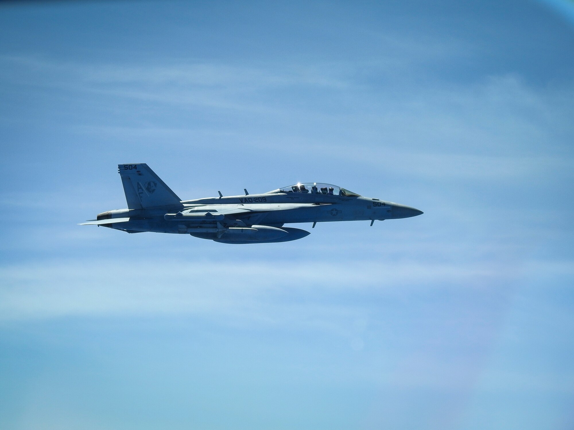 A United States Navy E/A-18G Growler from Electronic Attack Squadron 209, the “Star Warriors,” flies with a B-52H Stratofortress deployed from Barksdale Air Force Base, La., over the Sea of Japan while conducting a Bomber Task Force mission June 16, 2020. U.S. Strategic Command operations and engagements with U.S. allies and partners demonstrate and strengthen a shared commitment to global security and stability. (Courtesy photo)