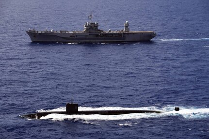 PHILLIPPINE SEA (June 14, 2020) Los Angeles-class fast-attack submarine, USS Asheville (SSN 758), transits alongside U.S. 7th Fleet flagship USS Blue Ridge (LCC 19) during a submarine familiarization (SUBFAM). The SUBFAM was conducted so Blue Ridge's crew and embarked 7th Fleet staff could observe the characteristics of a submarine and how it looks both digitally and visually at periscope depth. Blue Ridge is the oldest operational ship in the Navy, and, as 7th Fleet flagship, actively works to foster relationships with allies and partners in the Indo-Pacific region.