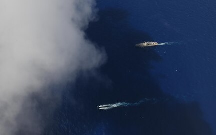 PHILLIPPINE SEA (June 14, 2020) Los Angeles-class fast-attack submarine, USS Asheville (SSN 758), transits alongside U.S. 7th Fleet flagship USS Blue Ridge (LCC 19) during a submarine familiarization (SUBFAM). The SUBFAM was conducted so Blue Ridge's crew and embarked 7th Fleet staff the opportunity to observe the characteristics of a submarine and how it looks both digitally and visually at periscope depth. Blue Ridge is the oldest operational ship in the Navy, and, as 7th Fleet flagship, actively works to foster relationships with allies and partners in the Indo-Pacific region.