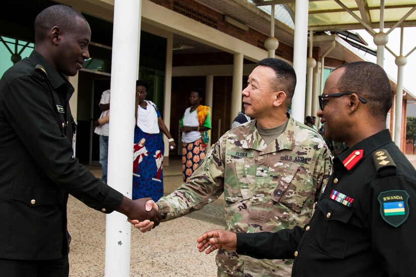 U.S. Army Brig. Gen. Lapthe Flora, deputy commanding general for U.S. Army Africa, greets a Rwandan Soldier during MEDRETE 18-5 at the Rwanda Military Hospital, Kigali, Rwanda, Aug. 20, 2018.