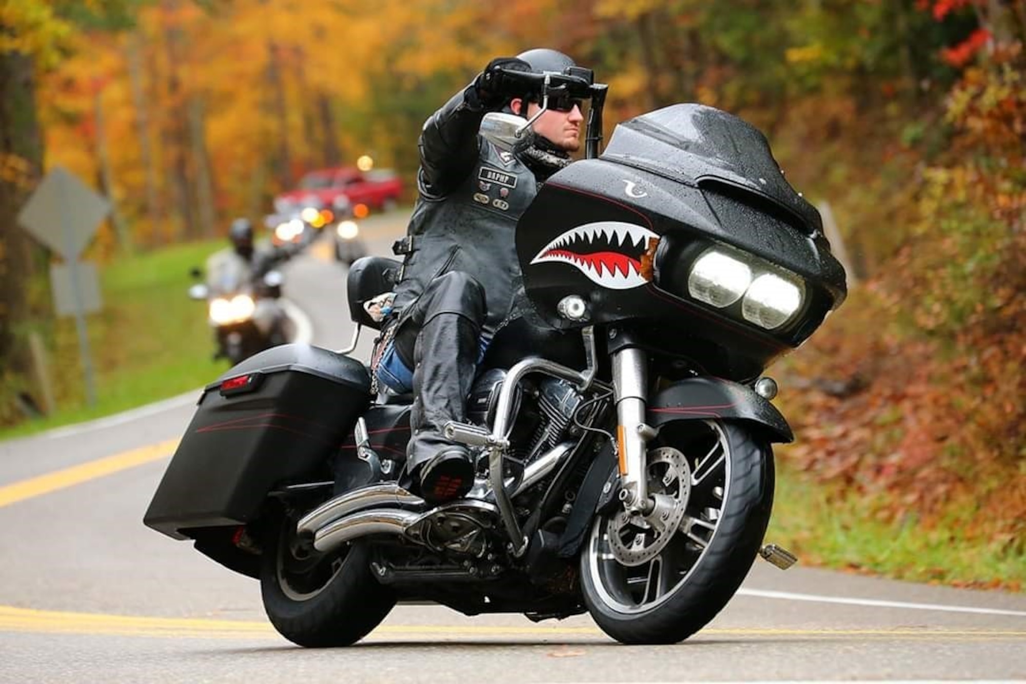 Photo of SSgt. Johnny Brauer, 288th Operations Support Squadron riding his 2015 Harley Davidson Road Glide.