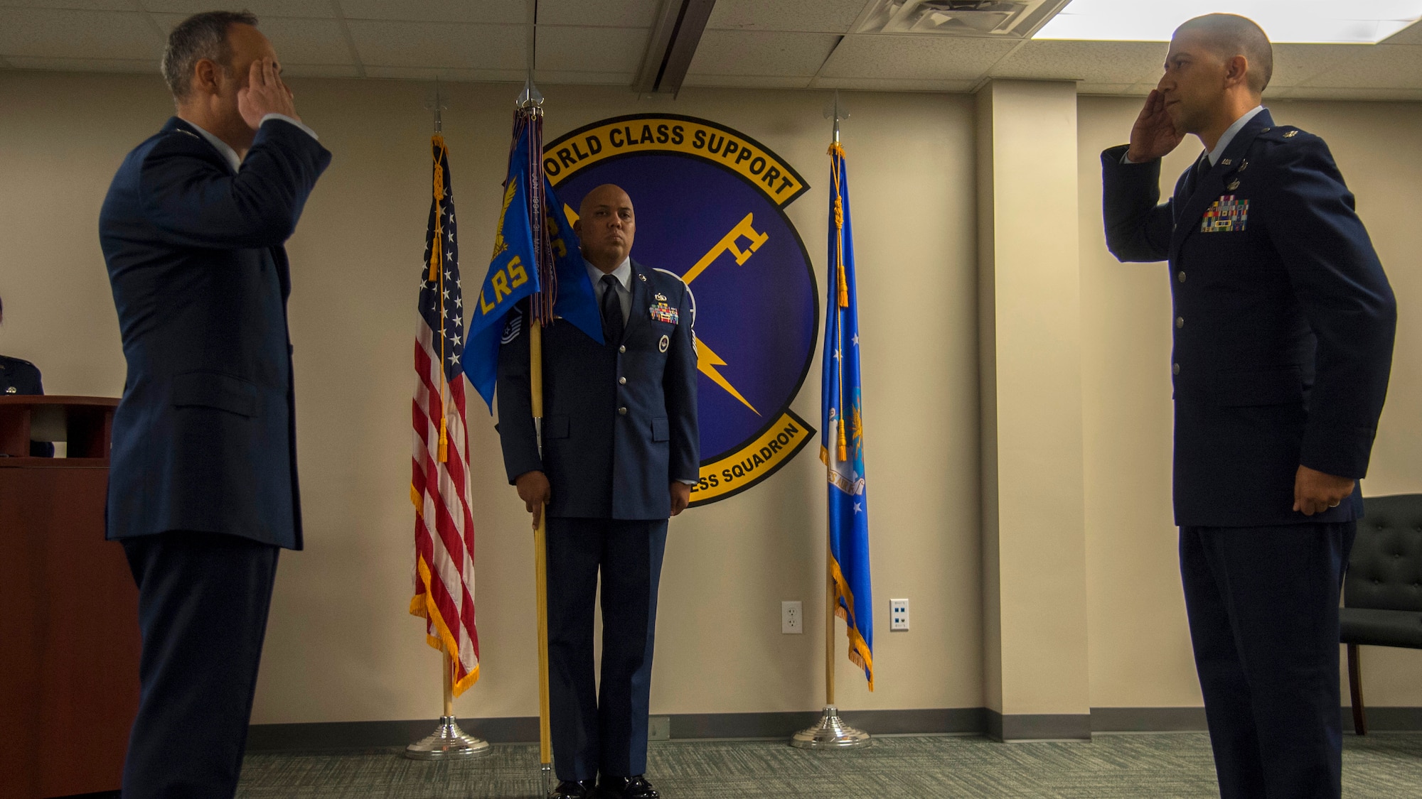 U.S. Air Force Col. Edward Phillips, the 6th Mission Support Group commander, salutes Lt. Col. Christopher Martagon, the 6th Logistics Readiness Squadron commander, during a change of command ceremony, June 12, 2020, at MacDill Air Force Base, Fla.