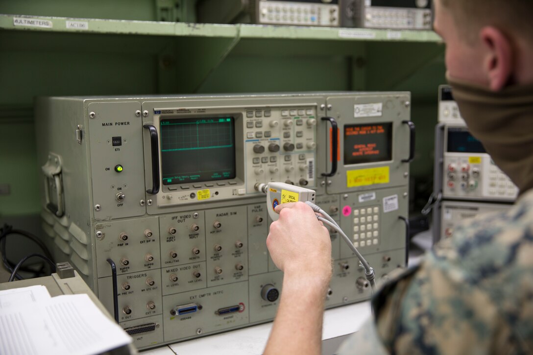 U.S. Marines with Marine Aviation Logistics Squadron (MALS) 13, calibrate aircraft electronics on Marine Corps Air Station (MCAS) Yuma, May 27, 2020. The calibration work center is responsible for maintaining mission readiness across all MCAS Yuma tenant squadrons and 6,000 items through calibration and equipment repair for aircraft electronics, armory gauges, and weapon test sets. (U.S. Marine Corps photo by Lance Cpl John Hall)