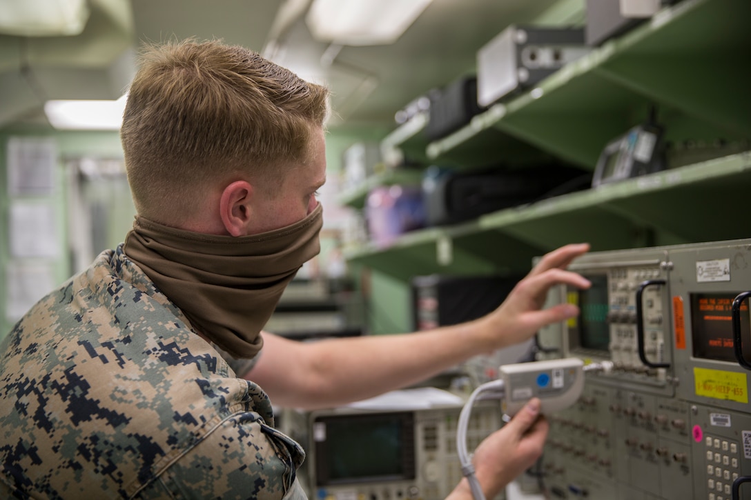 U.S. Marines with Marine Aviation Logistics Squadron (MALS) 13, calibrate aircraft electronics on Marine Corps Air Station (MCAS) Yuma, May 27, 2020. The calibration work center is responsible for maintaining mission readiness across all MCAS Yuma tenant squadrons and 6,000 items through calibration and equipment repair for aircraft electronics, armory gauges, and weapon test sets. (U.S. Marine Corps photo by Lance Cpl John Hall)
