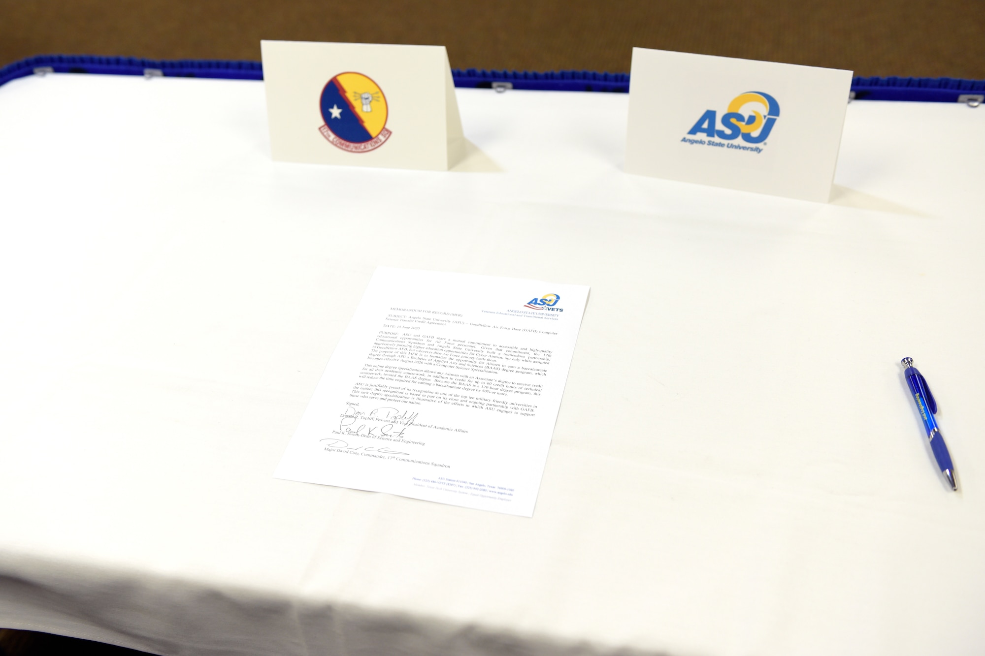 The ink dries on a newly signed agreement between Angelo State University and Goodfellow Air Force Base at ASU’s Houston Harte University Center, in San Angelo, Texas, June 15, 2020. This agreement will make continuing higher education more efficient for individuals, by reducing the time required for earning this 120-hour Bachelor of Applied Arts and Science by 50% or more.  (U.S. Air Force photo by Senior Airman Zachary Chapman)