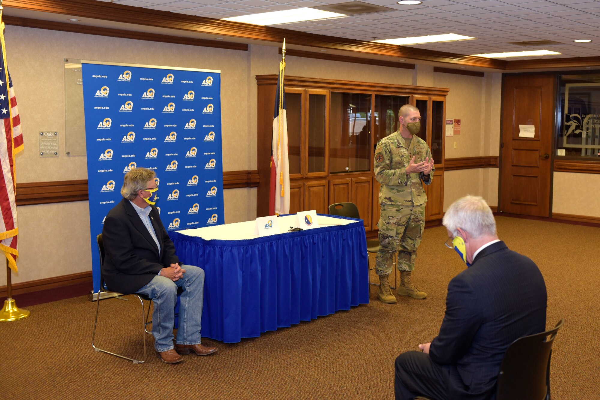 U.S. Air Force Major David Coté, 17th Communication Squadron commander, speaks with members of Angelo State University the new agreement allowing 17th CS members to earn a Bachelor of Applied Arts and Science more efficiently at ASU’s Houston Harte University Center, in San Angelo, Texas, June 15, 2020. This new agreement will take effect August 2020, and will allow Airmen to apply credit from all of their academic coursework, as well as credit for up to 60 credit hours of technical course work. (U.S. Air Force photo by Senior Airman Zachary Chapman)