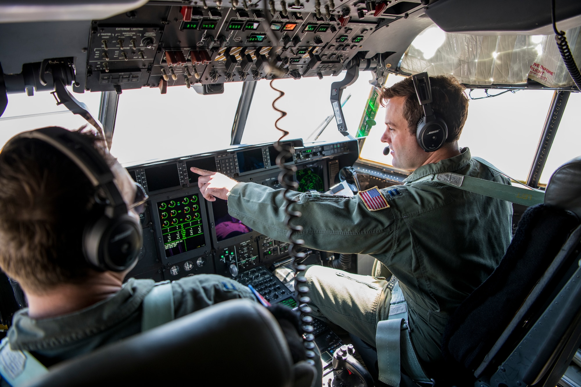 Capt. Forrest Heintz, 53rd Weather Reconnaissance Squadron pilot, programs radio frequencies prior to take off, June 15 at Keesler Air Force Base, Miss.  The Hurricane Hunters deployed to St. Croix to fly training missions over the Caribbean in preparation for the 2020 hurricane season. (U.S. Air Force photo by Tech. Sgt. Christopher Carranza)