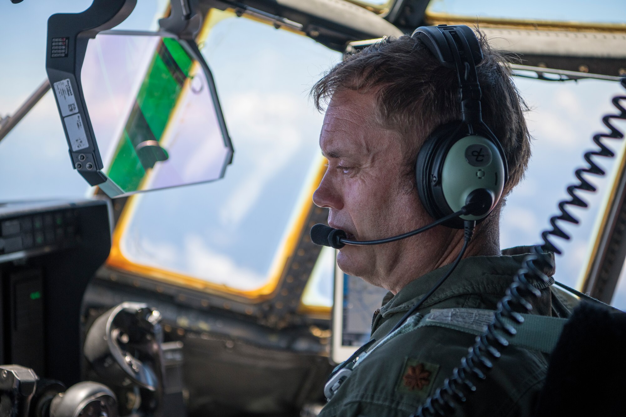 Maj. Eric Chapman, 53rd Weather Reconnaissance Squadron pilot, monitors the aircraft instruments of a WC-130J Super Hercules aircraft, June 17, over the Caribbean. The Hurricane Hunters deployed to St. Croix to fly training missions over the Caribbean in preparation for the 2020 hurricane season. (U.S. Air Force photo by Tech. Sgt. Christopher Carranza)