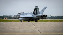 A U.S. Navy Boeing EA-18Gs taxis down the runway during a PAC Weasel exercise at Misawa Air Base, Japan, June 19, 2020. During PAC Weasel, the desired learning objectives are created by the tactical experts within all the participating units and because of the mission planning activities, execution and debrief produce more tactical and beneficial lessons learned. (U.S. Air Force photo by Airman 1st Class China M. Shock)