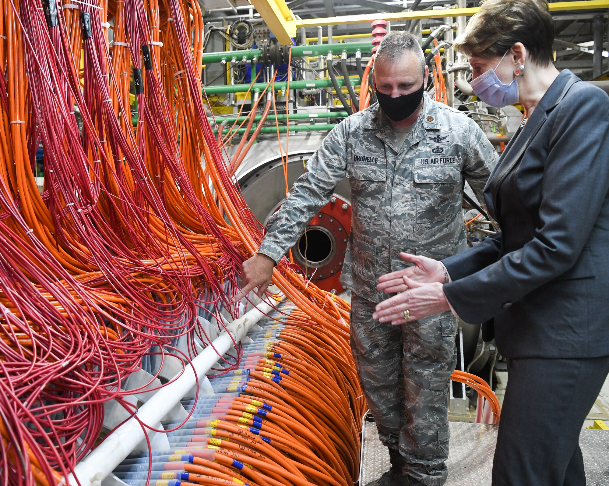 Maj. Christopher Brunelle, director of operations for the Arnold Engineering Development Complex Space and Missile Branch, explains the construction of an arc heater to Secretary of the Air Force Barbara Barrett during her visit, June 18, 2020, to Arnold Air Force Base, Tenn. Arc heaters provide high-enthalpy test environments to test materials and other means of thermal protection. (U.S. Air Force photos by Jill Pickett)