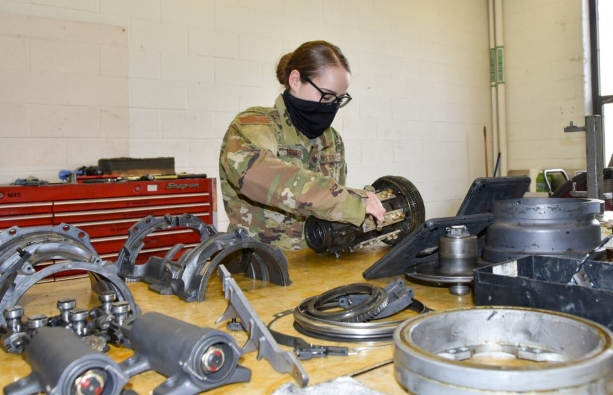 Staff Sergeant Carmen Moore, 301st Maintenance Squadron Armament Technician, works on F-16 Fighting Falcon weapon segments in her assigned work center at U.S. Naval Air Station Joint Reserve Base Fort Worth, Texas on June 17, 2020. Moore, an Air Reserve Technician with six years of service dedicated to the 301st Fighter Wing, was selected as the Air Force Reserve Command Armament Systems Awards Technician of the Year for 2019. (U.S. Air Force photo by Capt. Jessica Gross)