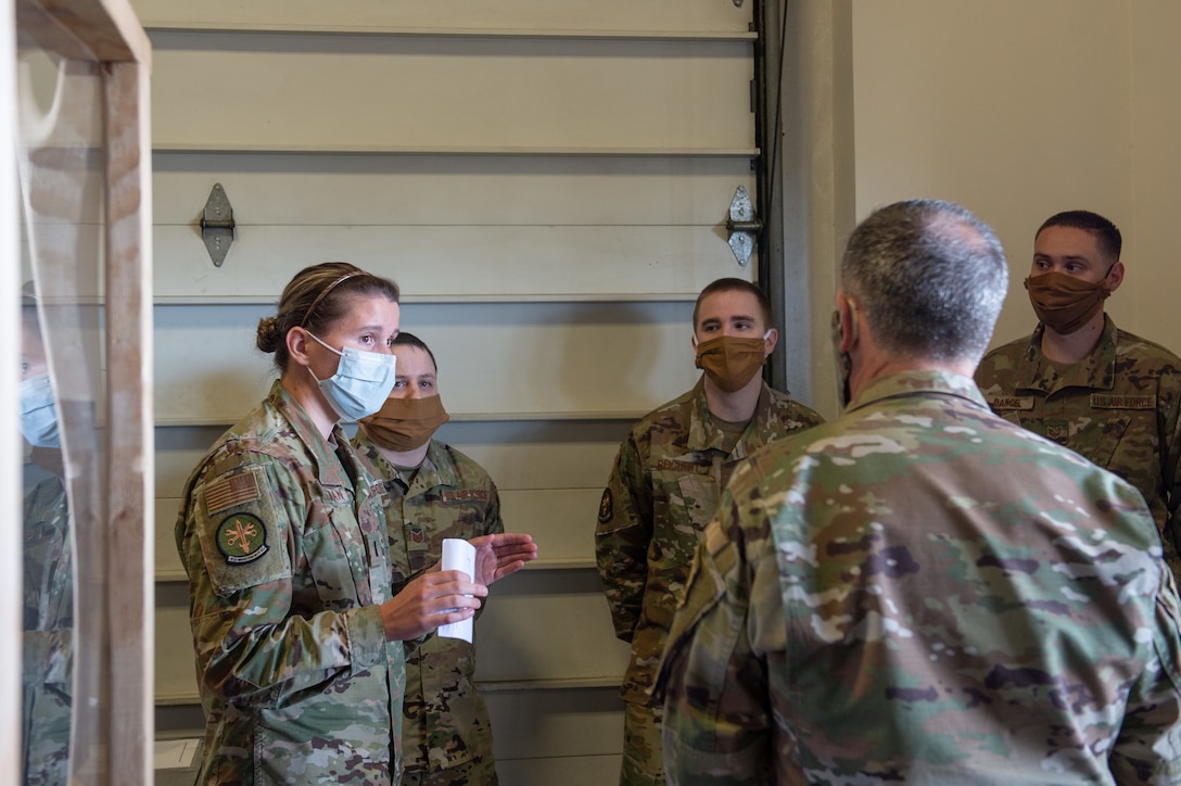 First Lt. Kristina O’Sullivan, 62nd Aircraft Maintenance Squadron flight commander, left, shows Gen. David Goldfein, chief of staff of the Air Force, right, how the 62nd AMXS Consolidated Tool Kit shop is preventing the spread of COVID-19 at Joint Base Lewis-McChord, Wash., June 18, 2020. Goldfein believes that if Airmen continue to remain disciplined and diligent following the procedures that have been put in place, the Air Force will continue to operate and survive during the pandemic. (U.S. Air Force photo by Senior Airman Sara Hoerichs)