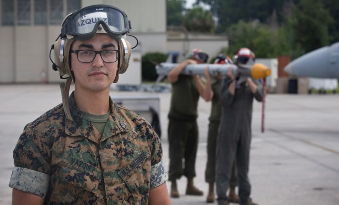 Sgt. Joseph L. Vazquez, a quality assurance representative with Marine-All Weather Fighter Attack Squadron 533, Marine Aircraft Group 31, 2nd Marine Aircraft Wing, poses for a photo at Marine Corps Air Station Beaufort, S.C., June 10, 2020. “A good leader will tell you how to do a task, but a great leader will be there doing the task with you,” said Vazquez, a Castlebury, Fla., native. According to his leadership, Vazquez was chosen for his superior achievements as a sergeant, Vazquez has been managing the Naval Aviation Maintenance Discrepancy Reporting Program, usually reserved for a senior staff noncommissioned officer. He received the only noteworthy program evaluation during the squadron’s most recent inspection for his superior record keeping. (U.S. Marine Corps photo by Lance Cpl. Aidan Parker)