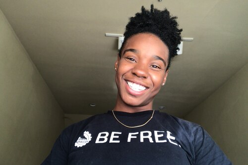 U.S. Air Force 2d Lt. Destini Hamilton smiles in her “be free” t-shirt.