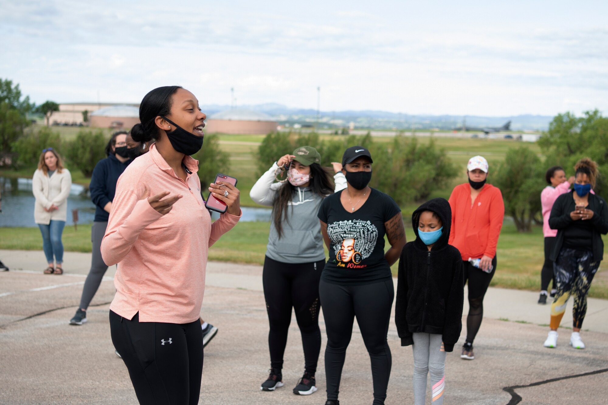 aster Sgt. Jessica Wheeler, the 28th Force Support Squadron section chief of readiness and plans, talks to participants of a memorial walk for Juneteenth at Ellsworth Air Force Base, S.D., June 19, 2020.