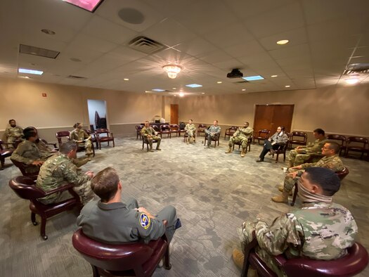 Members of Laughlin Air Force Base, Texas gather in a circle June 10, 2020. Col. Lee Gentile, 47th Flying Training Wing commander, and Chief Master Sgt. Robert Zackery III, 47th Flying Training Wing command chief, led a series of discussions about racial injustices within our nation. (U.S. Air Force photo by Senior Airman Marco A. Gomez)