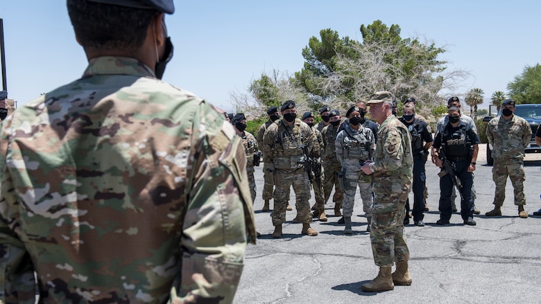 Air Force Chief of Staff Gen. David Goldfein talks to members of the 412th Security Forces Squadron prior to their Guard Mount procedures at Edwards Air Force Base, California, June 17. (Air Force photo by Giancarlo Casem)
