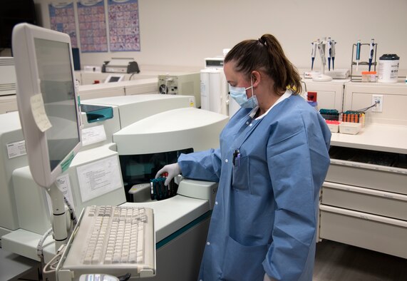 PETERSON AIR FORCE BASE, Colo. - Corey Cavanaugh, lead chemistry technician at the 21st Medical Group laboratory, prepares samples for testing. The lab at Peterson Air Force Base, Colorado, generates more than 4,700 lab results on average each month. (U.S. Air Force photo by Kristen Allen)
