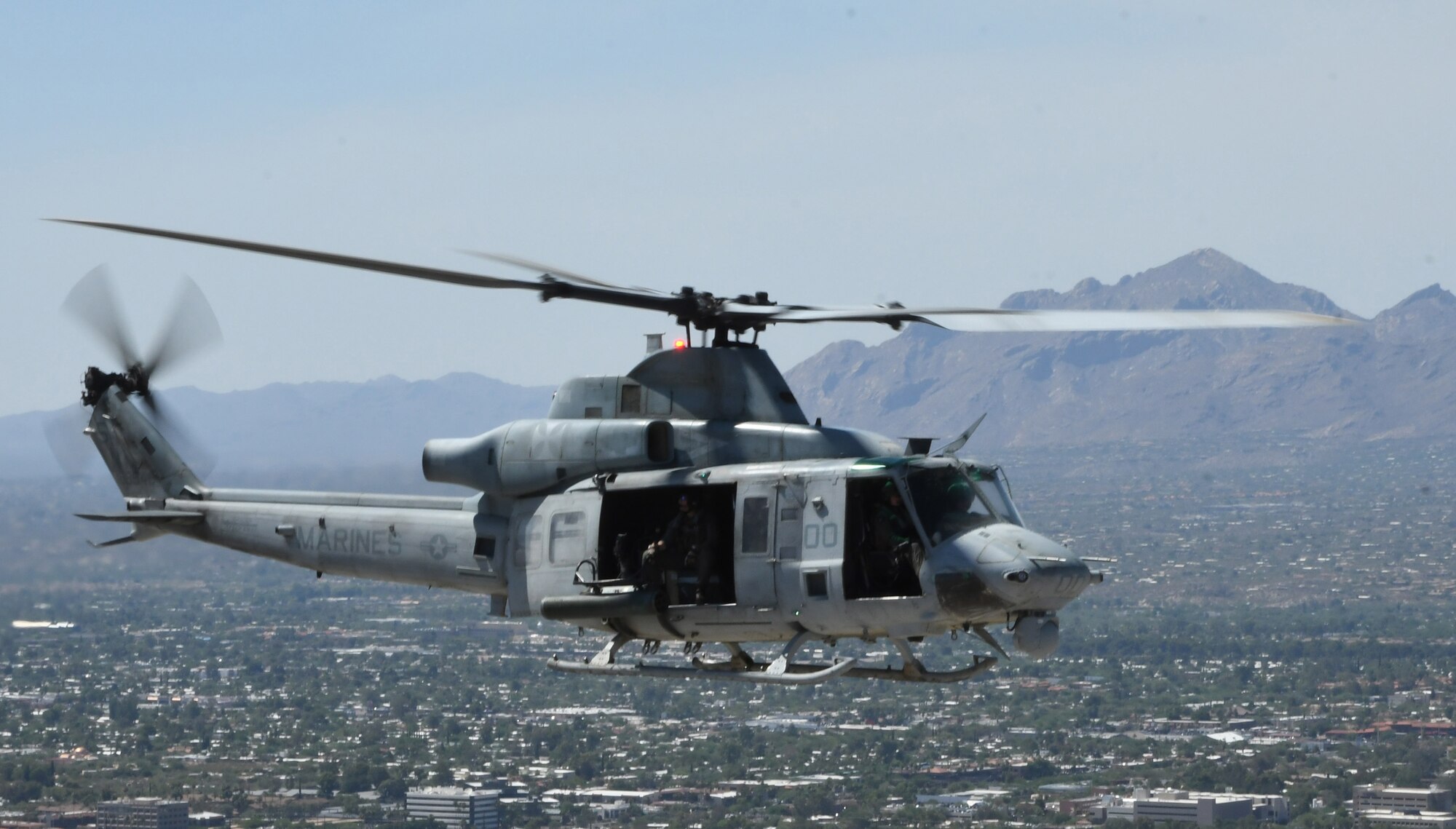 A picture of a helicopter flying.