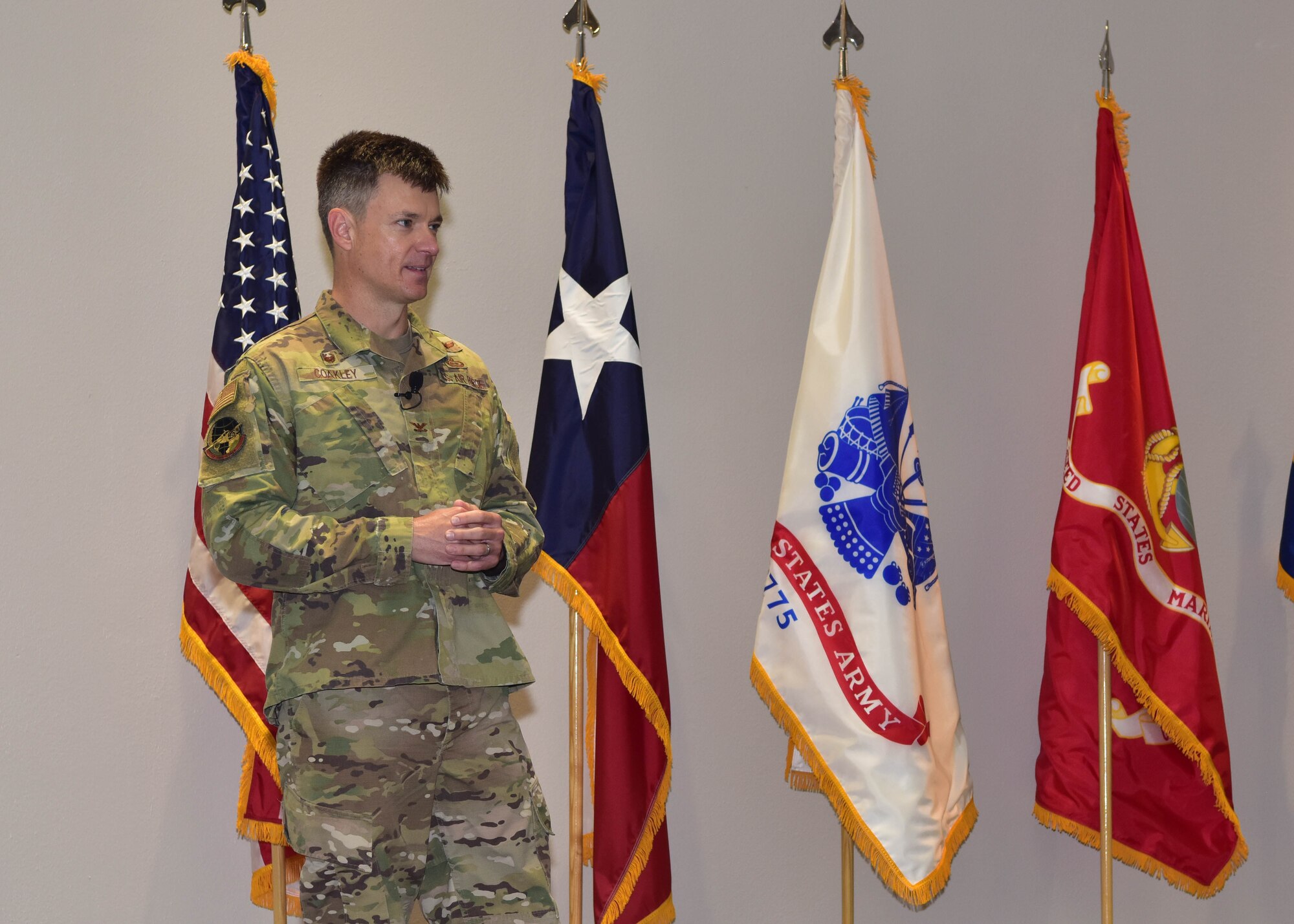 U.S. Air Force Col. Thomas Coakley, 17th Training Group commander, speaks during the 17th TRG Change of Command ceremony on Goodfellow Air Force Base, Texas, June 18, 2020. Coakley relinquished command to Col. Angelina Maguinness, incoming commander, in the time-honored tradition which is meant to introduce a new leader to the troops under their charge. (U.S. Air Force photo by Staff Sgt. Chad Warren)