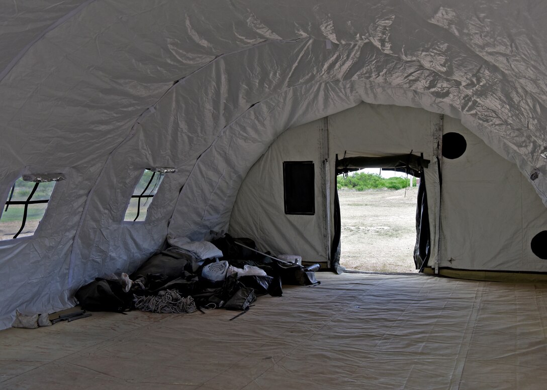 The inside view of an empty medical tent is temporarily set up outside the Marine Corps Detachment on Goodfellow Air Force Base, Texas, June 17, 2020.  The tent was used to combat COVID-19 with containment efforts. (U.S. Air Force photo by Airman 1st Class Michael Bowman)