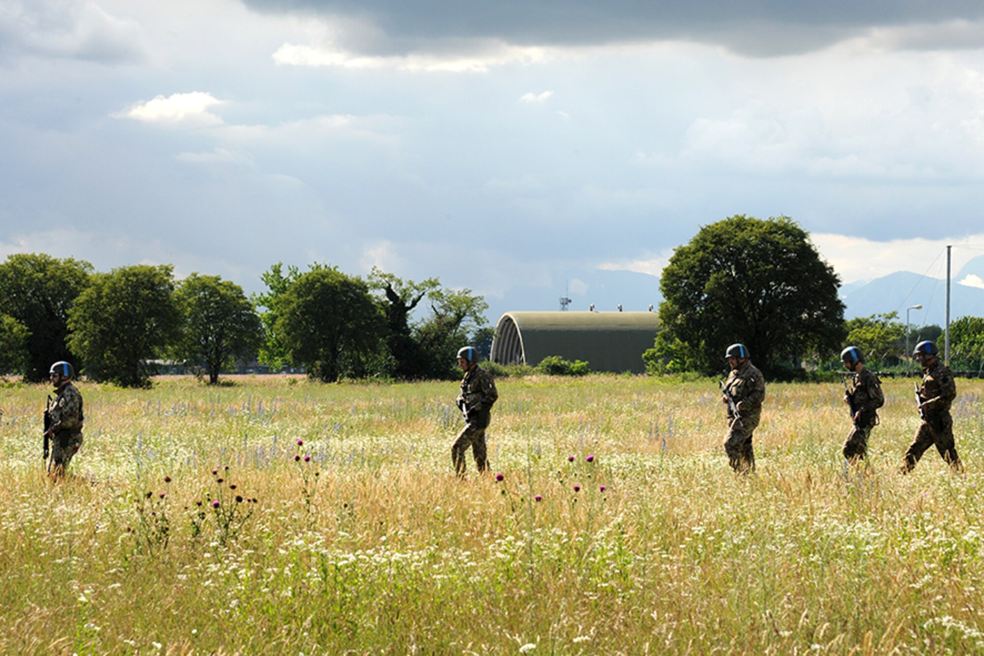 Italian Air Force members perform a perimeter patrol during an exercise at Rivolto Air Base, Italy, June 11, 2020. Italian Air Force security forces volunteers played the role of the opposing force during the exercise and were tasked with patrolling the perimeter to spot suspicious activity. 
(Photos by Italian Air Force 2nd Wing and U.S. Air Force)