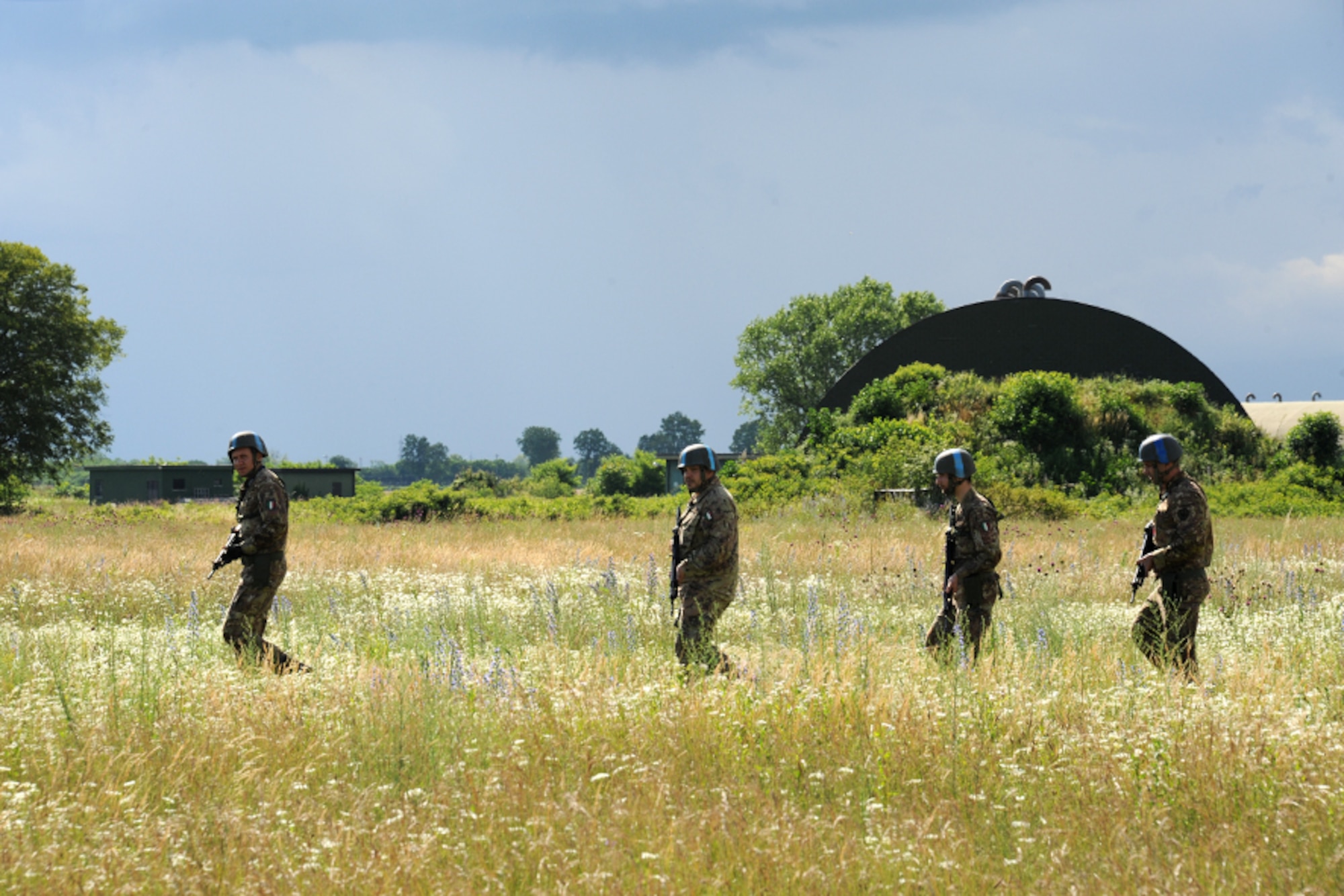 Italian Air Force members perform a perimeter patrol during an exercise at Rivolto Air Base, Italy, June 11, 2020. Italian Air Force security forces volunteers played the role of the opposing force during the exercise and were tasked with patrolling the perimeter to spot suspicious activity. (Photos by Italian Air Force 2nd Wing and U.S. Air Force)