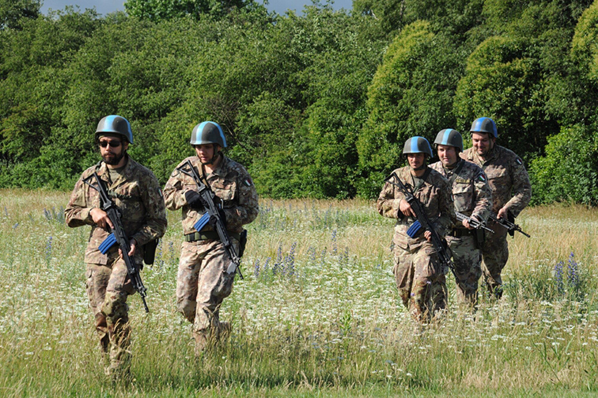 Italian Air Force members perform a perimeter patrol during an exercise at Rivolto Air Base, Italy, June 11, 2020. Italian Air Force security forces volunteers played the role of the opposing force during the exercise and were tasked with patrolling the perimeter to spot suspicious activity. (Photos by Italian Air Force 2nd Wing and U.S. Air Force)