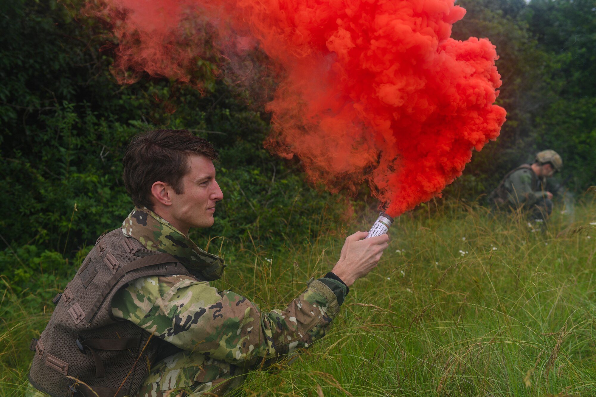 U.S. Air Force Capt. James Gregory, 510th Fighter Squadron pilot, pops a flare to signal an aircraft during an exercise at Rivolto Air Base, Italy, June 10, 2020. The pilots were undergoing a simulated Survival, Evasion, Resistance, Escape (SERE) training in which they had to survive and make contact with the proper sources after landing in enemy territory. (U.S. Air Force photo by Airman 1st Class Thomas S. Keisler IV)