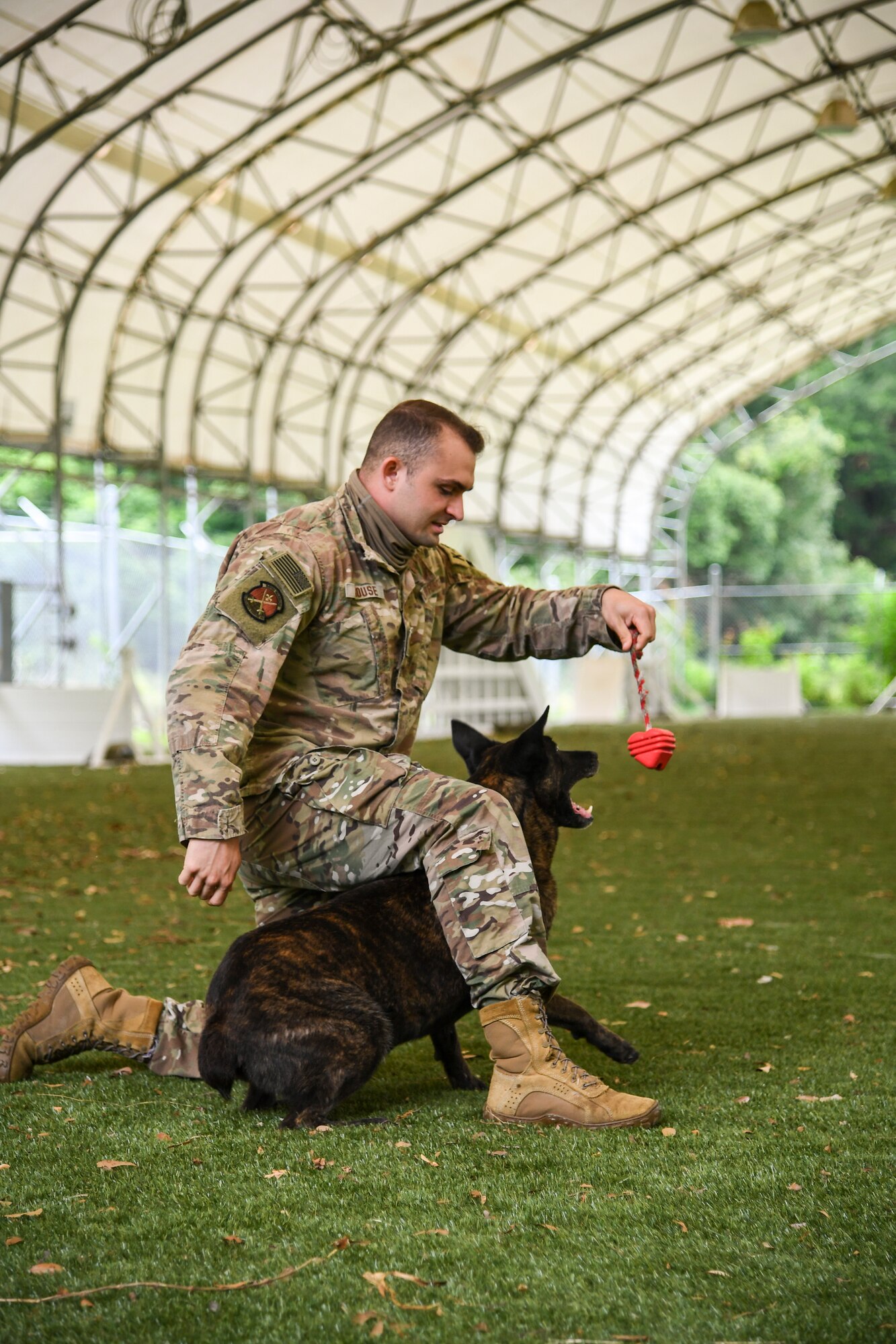 Airmen, canines work paw-in-hand