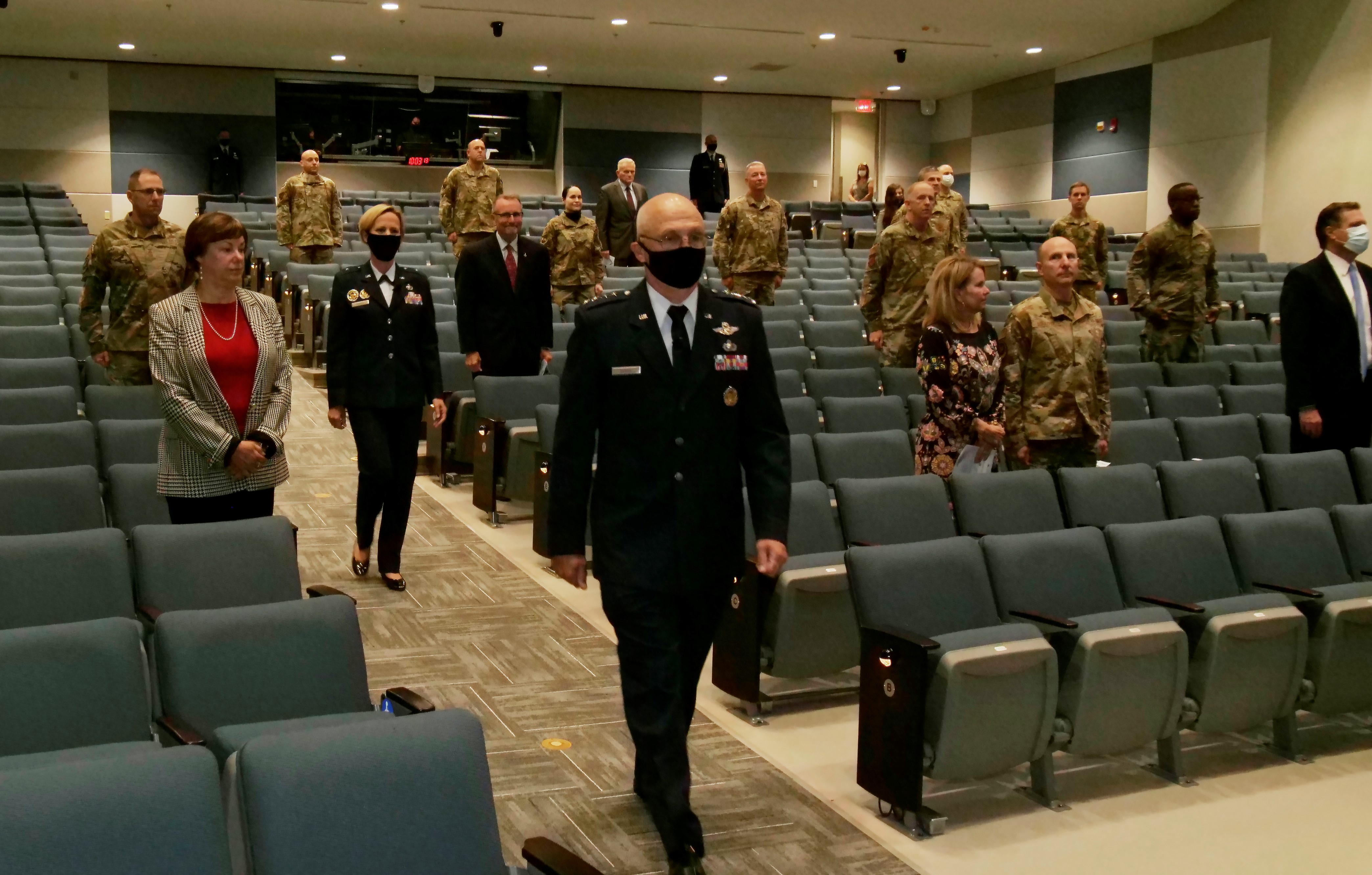 Gen. Arnold W. Bunch, commander, Air Force Materiel Command, and Brig. Gen. Heather L. Pringle arrive for the assumption of command ceremony June 18 at the Air Force Institute of Technology’s Kenney Hall Auditorium. Brig. Gen. Pringle is the new commander of the Air Force Research Laboratory, headquartered at Wright Patterson AFB, Ohio.  (U.S. Air Force Photo/Keith Lewis)