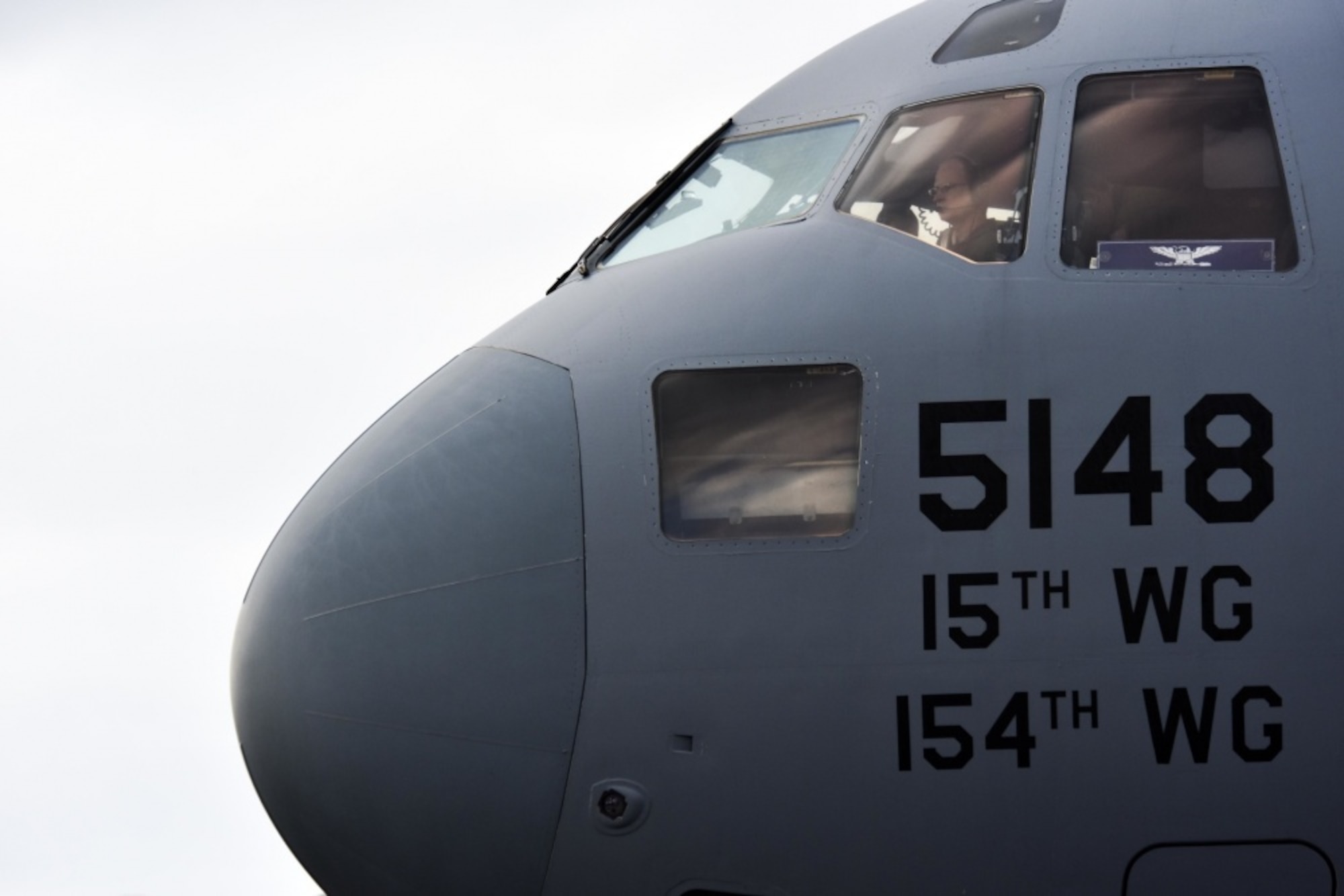 U.S. Air Force Col. W. Halsey Burks, 15th Wing commander, prepares for takeoff before his fini flight at Joint Base Pearl Harbor-Hickam, Hawaii, June 9, 2020. Burks, who served as the wing commander since June 2018, will retire later this year. Tail number 5148 is the same aircraft Burks flew from the Boeing factory to Hickam Field in 2006. (U.S. Air Force photo by Tech. Sgt. Anthony Nelson Jr.)
