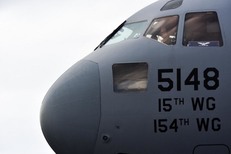 U.S. Air Force Col. W. Halsey Burks, 15th Wing commander, prepares for takeoff before his fini flight at Joint Base Pearl Harbor-Hickam, Hawaii, June 9, 2020. Burks, who served as the wing commander since June 2018, will retire later this year. Tail number 5148 is the same aircraft Burks flew from the Boeing factory to Hickam Field in 2006. (U.S. Air Force photo by Tech. Sgt. Anthony Nelson Jr.)